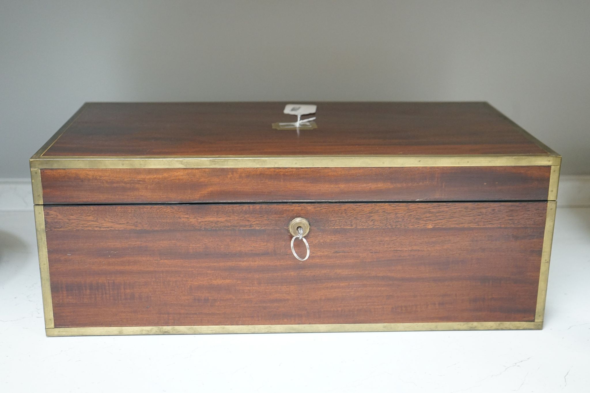 A 19th century mahogany and brass mounted writing slope, 51cm